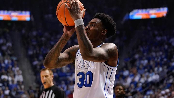 Mar 7, 2026; Provo, Utah, USA; BYU Cougars forward Kennard Davis Jr. (30) takes a jump shot during the first half against the Texas Tech Red Raiders at Marriott Center. Mandatory Credit: Aaron Baker-Imagn Images