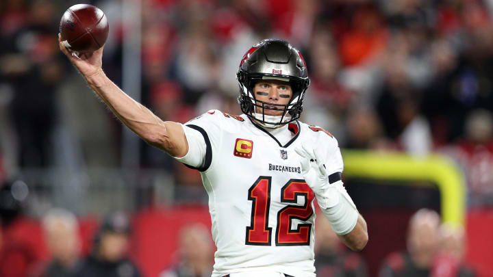 Jan 16, 2023; Tampa, Florida, USA; Tampa Bay Buccaneers quarterback Tom Brady (12) drops back to pass against the Dallas Cowboys during a wild card game at Raymond James Stadium. Mandatory Credit: Nathan Ray Seebeck-USA TODAY Sports