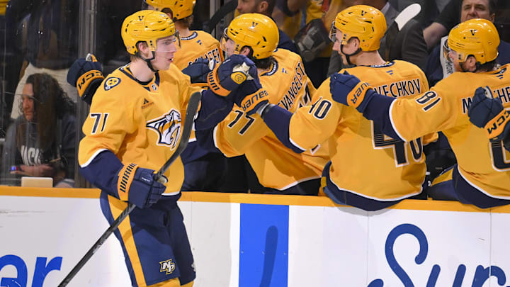 Nashville Predators right wing Matthew Wood (71) celebrates with his teammates after scoring a goal against the Boston Bruins Mar 5, 2026; Nashville, Tennessee, USA;  during the second period at Bridgestone Arena. Mandatory Credit: Steve Roberts-Imagn Images