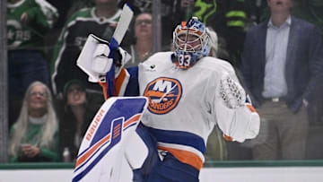 Nov 18, 2025; Dallas, Texas, USA; New York Islanders goaltender David Rittich (33) celebrates the Islanders victory over the Dallas Stars at the American Airlines Center. Mandatory Credit: Jerome Miron-Imagn Images