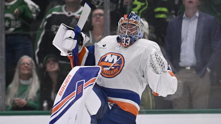 Nov 18, 2025; Dallas, Texas, USA; New York Islanders goaltender David Rittich (33) celebrates the Islanders victory over the Dallas Stars at the American Airlines Center. Mandatory Credit: Jerome Miron-Imagn Images