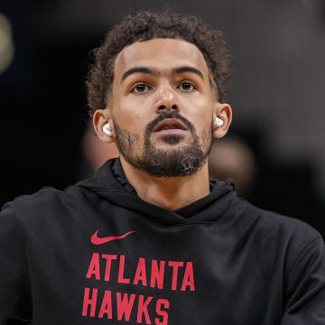 Apr 10, 2024; Atlanta, Georgia, USA; Atlanta Hawks guard Trae Young (11) shown while warming up on the court before the game Charlotte Hornets at State Farm Arena. Mandatory Credit: Dale Zanine-USA TODAY Sports