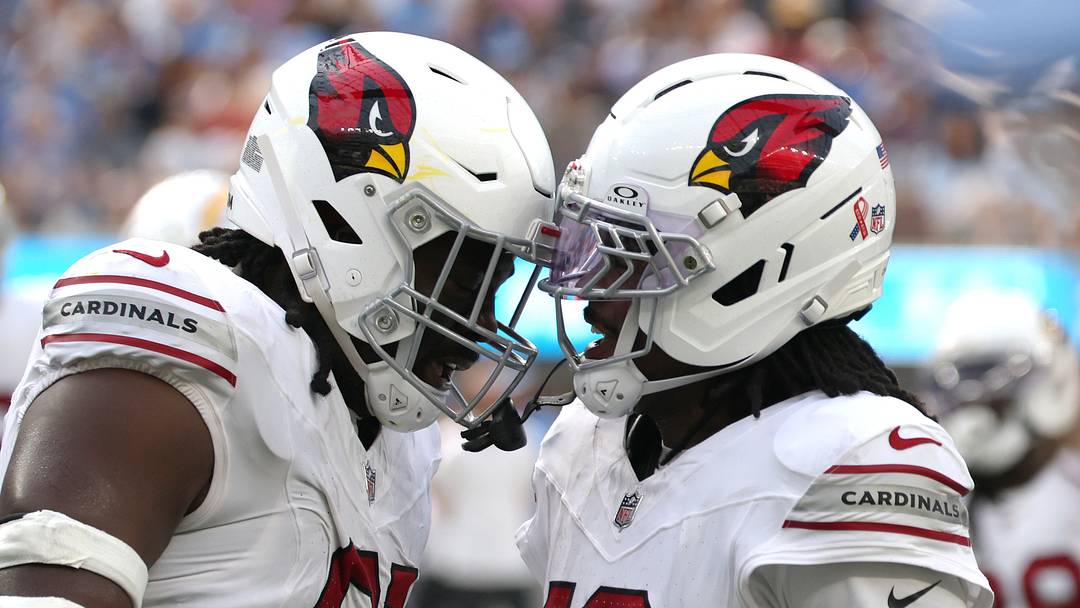 Sep 13, 2026; Inglewood, California, USA;  Arizona Cardinals defensive line L.J. Collier (91) reacts with cornerback Max Melton (16) after making a tackle against the Los Angeles Chargers during the fourth quarter at SoFi Stadium.  Mandatory Credit: Kiyoshi Mio-Imagn Images