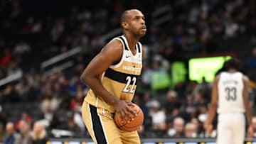 Nov 16, 2025; Washington, District of Columbia, USA;  Washington Wizards forward Khris Middleton (22) attempts a free throw against the Brooklyn Nets during the fourth quarter at Capital One Arena. Mandatory Credit: Rafael Suanes-Imagn Images