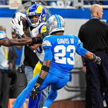 Detroit Lions cornerback Terrion Arnold (0) and cornerback Carlton Davis III (23).