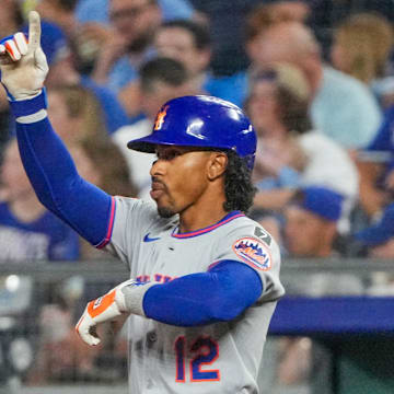 Jul 11, 2025; Kansas City, Missouri, USA; New York Mets shortstop Francisco Lindor (12) celebrates after hitting a single against the Kansas City Royals in the third inning at Kauffman Stadium. Mandatory Credit: Denny Medley-Imagn Images