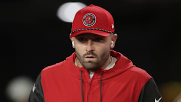 Jan 12, 2025; Tampa, Florida, USA; Tampa Bay Buccaneers quarterback Baker Mayfield (6) walks onto the field to warm up before a NFC wild card playoff against the Washington Commanders at Raymond James Stadium. Mandatory Credit: Nathan Ray Seebeck-Imagn Images