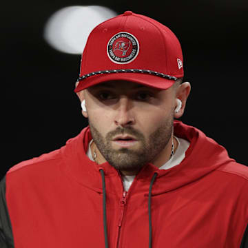 Jan 12, 2025; Tampa, Florida, USA; Tampa Bay Buccaneers quarterback Baker Mayfield (6) walks onto the field to warm up before a NFC wild card playoff against the Washington Commanders at Raymond James Stadium. Mandatory Credit: Nathan Ray Seebeck-Imagn Images