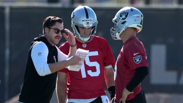 Jun 9, 2026; Henderson, NV, USA; Las Vegas Raiders offensive coordinator Andrew Janocko (left) talks with quarterbacks Fernando Mendoza (15) and Kirk Cousins (8) during minicamp at Intermountain Health Performance Center. Mandatory Credit: Kirby Lee-Imagn Images