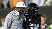 Sep 20, 2025; Boulder, Colorado, USA; Colorado Buffaloes head coach Deion Sanders and wide receiver Isaiah Hardge (17) during the first quarter against the Wyoming Cowboys at Folsom Field. Mandatory Credit: Ron Chenoy-Imagn Images
