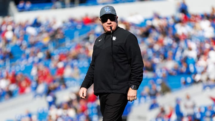 How much longer will Mark Stoops be head football coach at Kentucky? One anonymous rival weighs in.