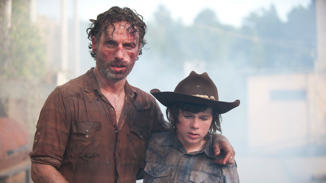 Rick Grimes (Andrew Lincoln) and Carl Grimes (Chandler Riggs) - The Walking Dead _ Season 4, Episode 8 - Photo Credit: Gene Page/AMC