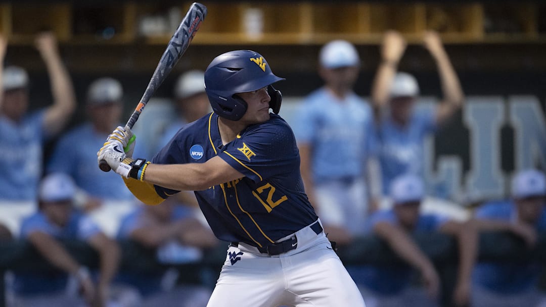 Jun 8, 2024; Chapel Hill, NC, USA; West Virginia Mountaineers Brodie Kresser (12) bats against the North Carolina Tar Heels in the second inning of the DI Baseball Super Regional at Boshamer Stadium. Mandatory Credit: Jeffrey Camarati-Imagn Images