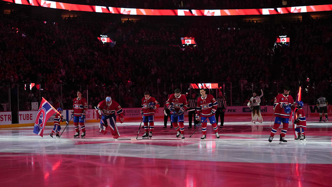 Jan 27, 2026; Montreal, Quebec, CAN; Montreal Canadiens players during the National Anthem before the game against the Vegas Golden Knights at the Bell Centre. Mandatory Credit: Eric Bolte-Imagn Images