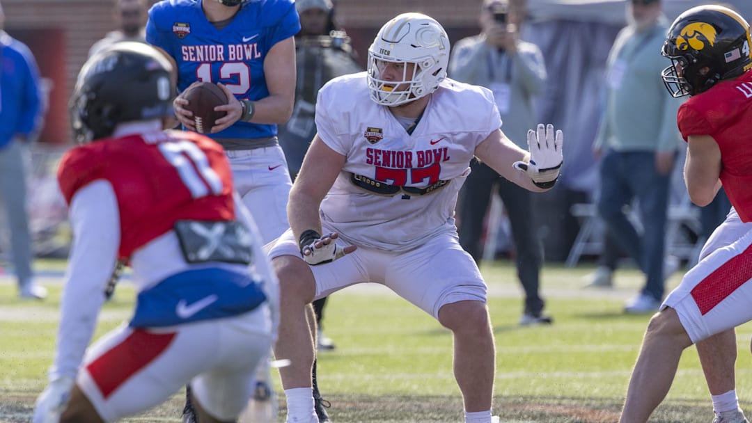 Jan 29, 2026; Mobile, AL, USA; National offensive lineman Keylan Rutledge (77) of Georgia Tech blocks during National Senior Bowl practice at Hancock Whitney Stadium. Mandatory Credit: Vasha Hunt-Imagn Images