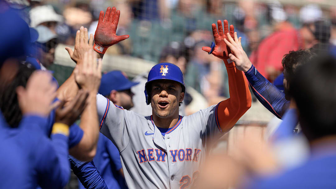 Sep 1, 2025; Detroit, Michigan, USA;  New York Mets right fielder Juan Soto (22) celebrates in the dugout after hitting a grand slam home run against the Detroit Tigers in the fourth inning at Comerica Park. Mandatory Credit: Lon Horwedel-Imagn Images