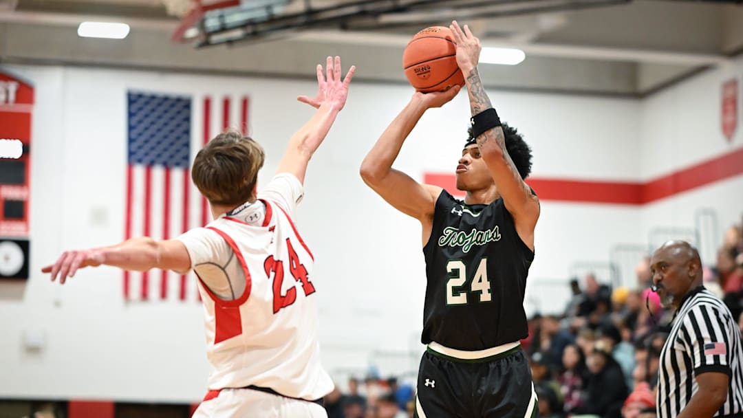 Wauwatosa West guard Jalen Brown shoots the ball.