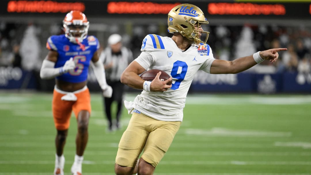 Dec 16, 2023; Inglewood, CA, USA; UCLA Bruins quarterback Collin Schlee (9) scrambles out of the pocket and heads toward the endzone against the Boise State Broncos during the third quarter of the Starco Brands LA Bowl at SoFi Stadium. Mandatory Credit: Robert Hanashiro-USA TODAY Sports