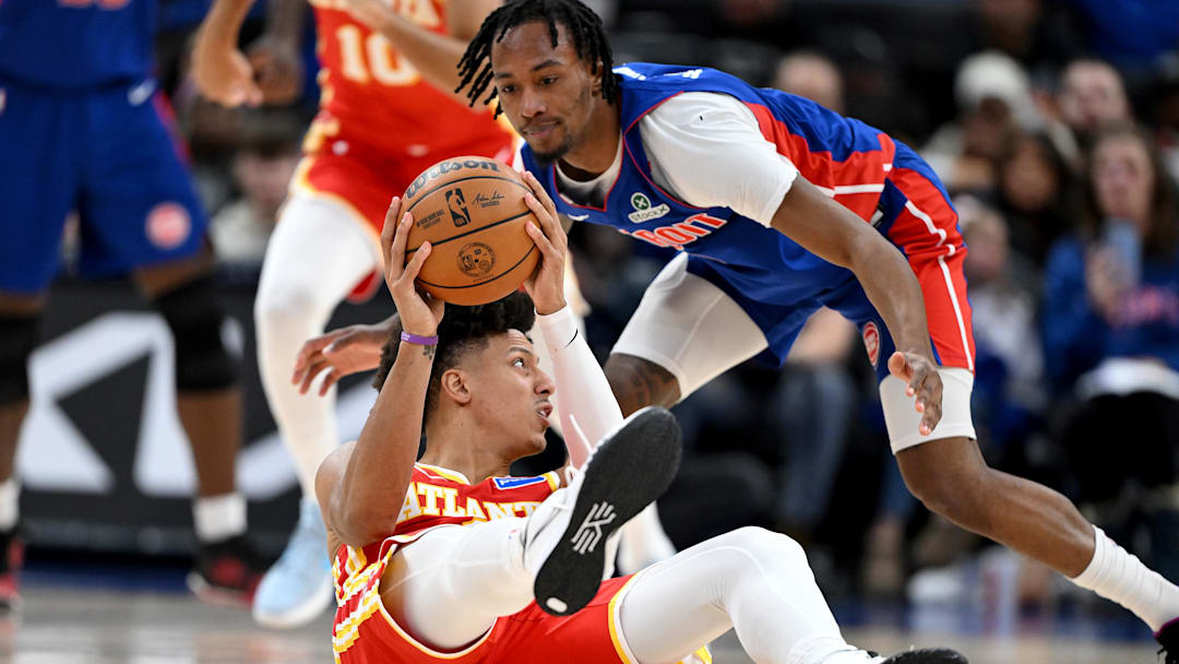 Dec 12, 2025; Detroit, Michigan, USA; Atlanta Hawks forward Jalen Johnson (1) looks to pass the ball after stealing it from Detroit Pistons forward Ronald Holland II (5) in the fourth quarter at Little Caesars Arena. Mandatory Credit: Lon Horwedel-Imagn Images Dec 12, 2025; Detroit, Michigan, USA; Atlanta Hawks forward Jalen Johnson (1) looks to pass the ball after stealing it from Detroit Pistons forward Ronald Holland II (5) in the fourth quarter at Little Caesars Arena. Mandatory Credit: Lon Horwedel-Imagn Images