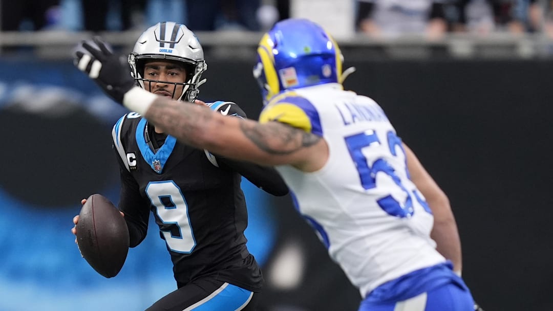 Jan 10, 2026; Charlotte, NC, USA; Carolina Panthers quarterback Bryce Young (9) drops back to pass against the Los Angeles Rams in the first half during the NFC Wild Card Round game at Bank of America Stadium. Mandatory Credit: Jim Dedmon-Imagn Images