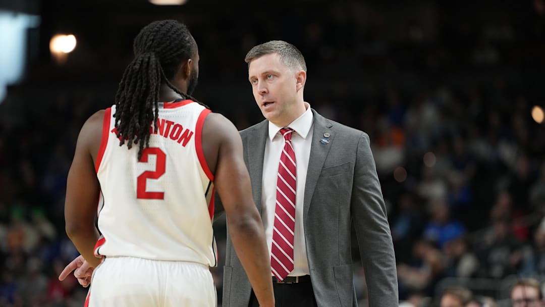 Mar 19, 2026; Greenville, SC, USA; Ohio State Buckeyes Jake Diebler talks with Bruce Thornton (2) in the first half during a first round game of the men's 2026 NCAA Tournament at Bon Secours Wellness Arena. Mandatory Credit: Bob Donnan-Imagn Images
