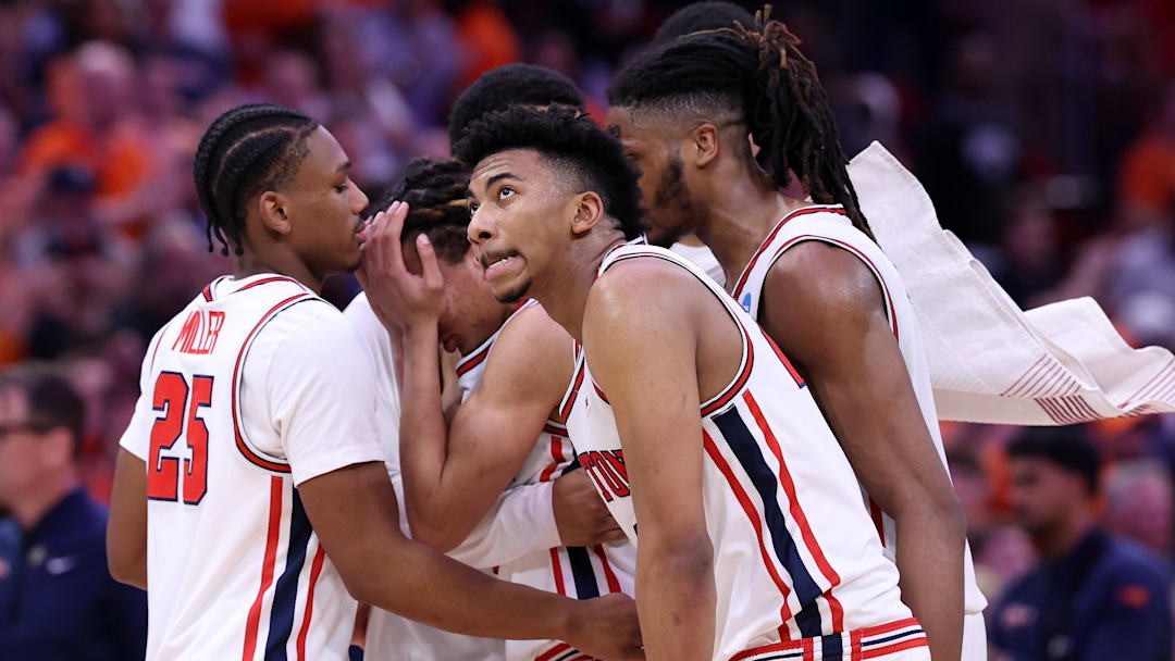 Mar 26, 2026; Houston, TX, USA; Houston Cougars guard Kingston Flemings (4) reacts after the game in a Sweet Sixteen game of the South Regional of the men's 2026 NCAA Tournament at Toyota Center. Mandatory Credit: Troy Taormina-Imagn Images