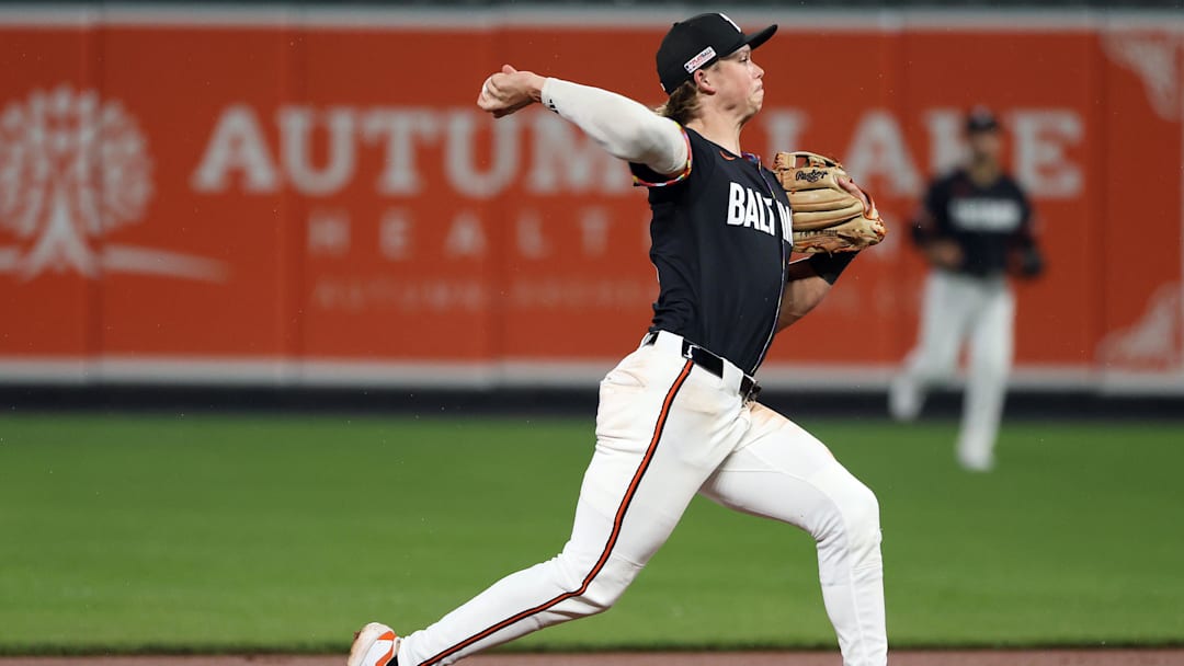 Jun 14, 2025; Baltimore, Maryland, USA; Baltimore Orioles second baseman Jackson Holliday (7) throws to first for an out during the sixth inning against the Los Angeles Angels at Oriole Park at Camden Yards.