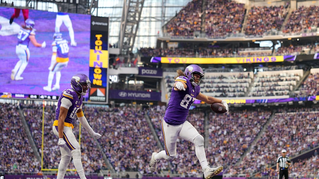 Dec 7, 2025; Minneapolis, Minnesota, USA; Minnesota Vikings tight end T.J. Hockenson (87) reacts after scoring a touchdown against the Washington Commanders during the second half at U.S. Bank Stadium. Mandatory Credit: Brad Rempel-Imagn Images