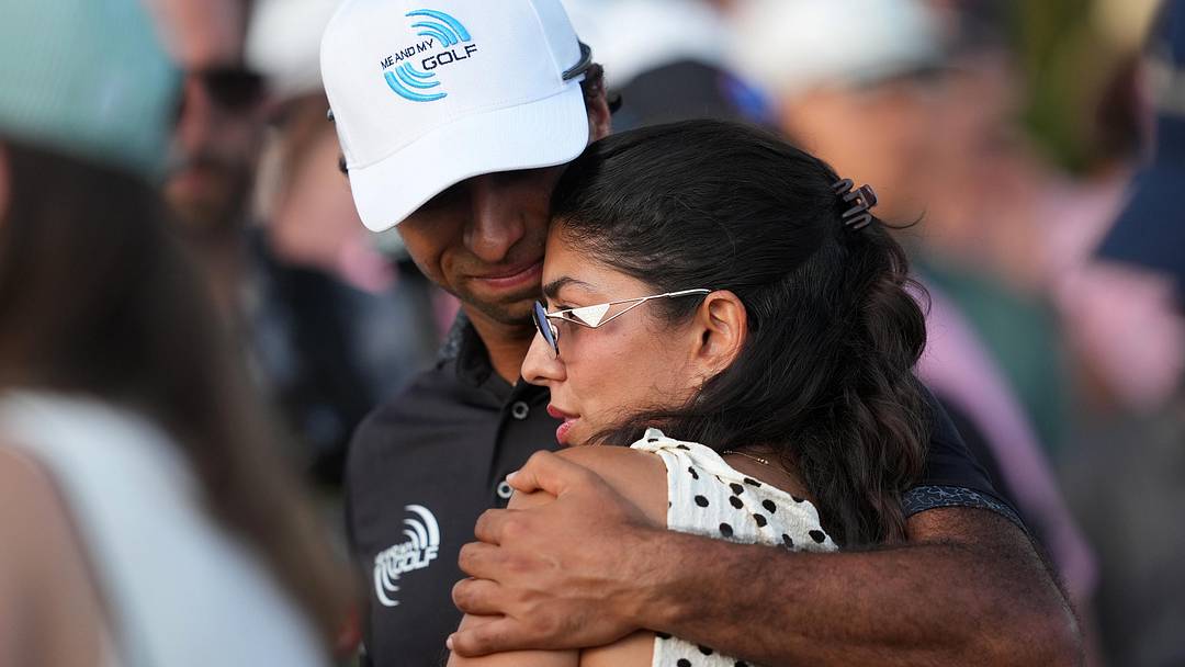 May 17, 2026: Aaron Rai reacts with his wife, Gaurika Bishnoi on the 18th hole during the final round of the PGA Championship golf tournament.