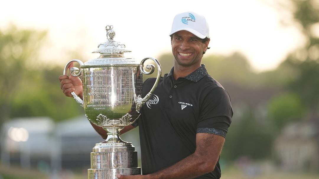 May 17, 2026: Aaron Rai reacts with the trophy after winning the final round of the PGA Championship golf tournament. 