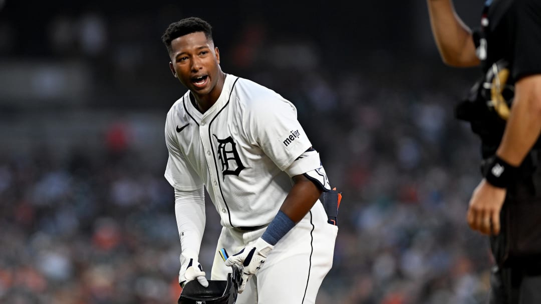 Aug 14, 2024; Detroit, Michigan, USA;  Detroit Tigers left fielder Justyn-Henry Malloy (44) has words with home plate umpire Adam Hamari after being called out on strikes against the Seattle Mariners in the seventh inning at Comerica Park.