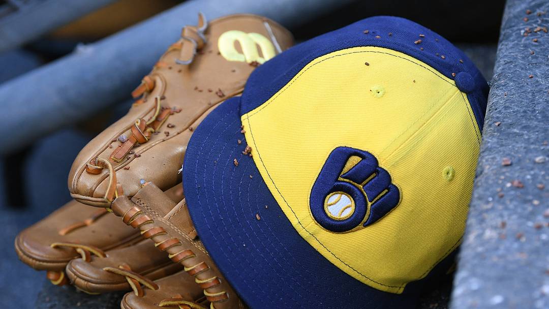 Apr 22, 2026; Detroit, Michigan, USA;  Milwaukee Brewers right fielder Sal Frelick (10) glove and hat sit on the Brewers dugout steps covered in infield dirt during their game against the Detroit Tigers at Comerica Park. Mandatory Credit: Lon Horwedel-Imagn Images