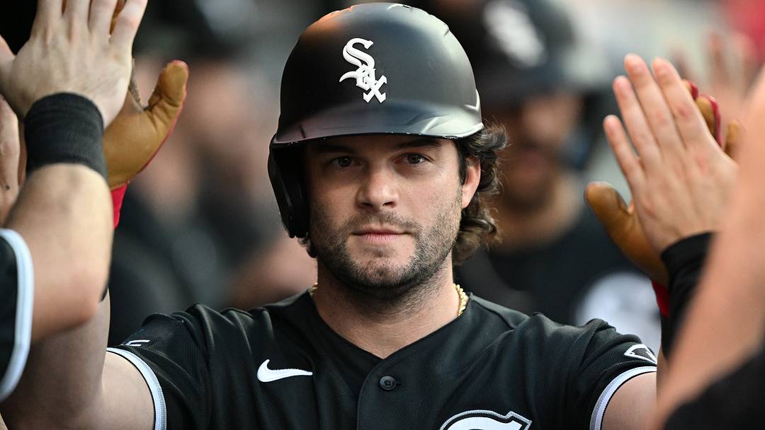Aug 14, 2026; Detroit, Michigan, USA;  Chicago White Sox designated hitter Andrew Benintendi (23) celebrates in the dugout after scoring a run against the Detroit Tigers in the fourth inning at Comerica Park. Mandatory Credit: Lon Horwedel-Imagn Images