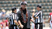 Aug 23, 2025; Honolulu, Hawaii, USA;  Stanford Cardinal head coach Frank Reich speaks to officials before an NCAA college football game against the Hawaii Rainbow Warriors at Clarence T.C. Ching Athletics Complex. Mandatory Credit: Marco Garcia-Imagn Images