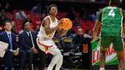 Nov 11, 2024; College Park, Maryland, USA; Maryland Terrapins guard Chance Stephens (13) takes a shot against Florida A&M Rattlers guard Sterling Young (4) during the second half at Xfinity Center. Mandatory Credit: Reggie Hildred-Imagn Images