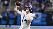 Jan 5, 2025; Detroit, Michigan, USA;  Minnesota Vikings quarterback Sam Darnold (14) throws passes during pregame warmups before their game against the Detroit Lions at Ford Field. Mandatory Credit: Lon Horwedel-Imagn Images