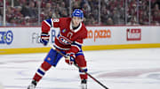 Apr 25, 2025; Montreal, Quebec, CAN; Montreal Canadiens defenseman Lane Hutson (48) plays the puck against the Washington Capitals during the second period in game three of the first round of the 2025 Stanley Cup Playoffs at the Bell Centre. Mandatory Credit: Eric Bolte-Imagn Images