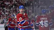 Apr 25, 2025; Montreal, Quebec, CAN; Montreal Canadiens forward Juraj Slafkovsky (20) celebrates after scoring a goal against the Washington Capitals during the third period in game three of the first round of the 2025 Stanley Cup Playoffs at the Bell Centre. Mandatory Credit: Eric Bolte-Imagn Images