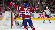 Apr 25, 2025; Montreal, Quebec, CAN; Montreal Canadiens forward Cole Caufield (13) celebrates after scoring a goal against Washington Capitals goalie Logan Thompson (48) during the second period in game three of the first round of the 2025 Stanley Cup Playoffs at the Bell Centre. Mandatory Credit: Eric Bolte-Imagn Images