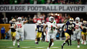 Ohio State Buckeyes running back Quinshon Judkins (1) gets away from the Notre Dame Fighting Irish defense on a long run in the third quarter during the College Football Playoff National Championship at Mercedes-Benz Stadium in Atlanta on January 20, 2025