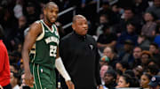 Apr 2, 2024; Washington, District of Columbia, USA; Milwaukee Bucks forward Khris Middleton (22) and head coach Doc Rivers look on during the second quarter against the Washington Wizards at Capital One Arena. Mandatory Credit: Reggie Hildred-Imagn Images