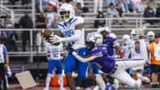IMG Academy High School junior Donovan Olugbode (1) makes a catch while being defended by Ben Davis High School senior Yassine Falke (13) during the first half of an IHSAA varsity football game, Friday, Sept. 8, 2023, at Ben Davis High School.