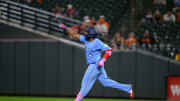 Toronto Blue Jays first baseman Vladimir Guerrero Jr. (27) hits a home run during the eighth inning against the Baltimore Orioles at Oriole Park at Camden Yards on July 29.