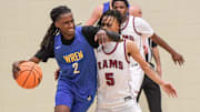 Wren High guard Abijah Franklin (2) dribbles around Westside guard Martinis Hemphill (5) during the second quarter of action at Westside High in Anderson, S.C. Friday, January 17, 2025.