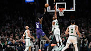 Apr 11, 2025; Boston, Massachusetts, USA; Charlotte Hornets center Mark Williams (5) shoots the ball against Boston Celtics center Al Horford (42) during the first half at TD Garden. Mandatory Credit: Eric Canha-Imagn Images