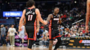 Mar 31, 2025; Washington, District of Columbia, USA; Miami Heat guard Terry Rozier (2) and guard Jaime Jaquez Jr. (11) celebrates during the fourth quarter against the Washington Wizards at Capital One Arena. Mandatory Credit: Reggie Hildred-Imagn Images