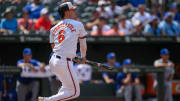 Jul 29, 2024; Baltimore, Maryland, USA; Baltimore Orioles first base Ryan Mountcastle (6) hits a single against the Toronto Blue Jays during the first inning at Oriole Park at Camden Yards.