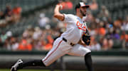 Jul 31, 2024; Baltimore, Maryland, USA; Baltimore Orioles pitcher Grayson Rodriguez (30) throws against the Toronto Blue Jays during the first inning at Oriole Park at Camden Yards. Mandatory Credit: Reggie Hildred-Imagn Images