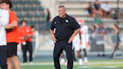 Sep 6, 2025; Honolulu, Hawaii, USA;  Sam Houston Bearkats interim head coach Phil Longo walks onto the field before his team takes on the Hawaii Rainbow Warriors at Clarence T.C. Ching Athletics Complex. Mandatory Credit: Marco Garcia-Imagn Images