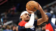 Mar 27, 2025; Washington, District of Columbia, USA; Washington Wizards guard Jordan Poole (13) takes a shot before a game against the Indiana Pacers at Capital One Arena. Mandatory Credit: Daniel Kucin Jr.-Imagn Images
